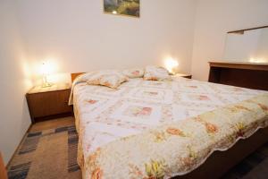 Posteľ alebo postele v izbe v ubytovaní Apartment Cirila