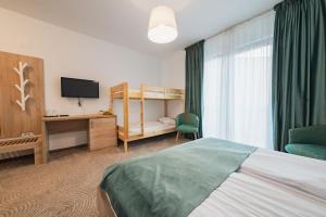 Ένα ή περισσότερα κρεβάτια σε δωμάτιο στο Hotel DADA Termal