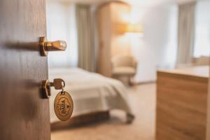 Ένα ή περισσότερα κρεβάτια σε δωμάτιο στο Hotel DADA Termal