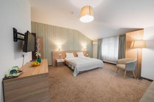 Ένα ή περισσότερα κρεβάτια σε δωμάτιο στο Hotel DADA Termal
