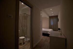 A bathroom at Onorati Hotel