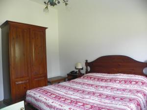 Postel nebo postele na pokoji v ubytování Hotel Les Granges
