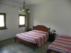Postel nebo postele na pokoji v ubytování Hotel Les Granges