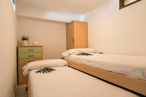 A bed or beds in a room at Apartment CB 1