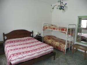 Postel nebo postele na pokoji v ubytování Hotel Les Granges