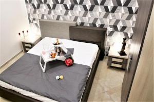 Postel nebo postele na pokoji v ubytování B&B Pompei Olympus