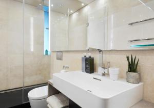 Um banheiro em Living Hotel Frankfurt
