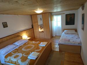 Postel nebo postele na pokoji v ubytování Nike house
