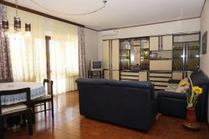 a living room with a couch and a table at Mariella in Bašanija