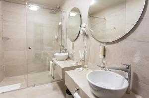 Koupelna v ubytování Hotel Grand Hedonist