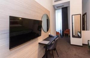 TV a/nebo společenská místnost v ubytování Hotel Grand Hedonist