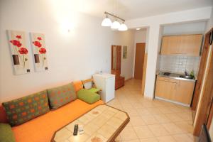 Kuchyň nebo kuchyňský kout v ubytování Apartments Knežević