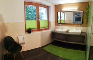 Ένα μπάνιο στο Ferienhaus Sonnhof am Walchsee +35 φωτογραφίες