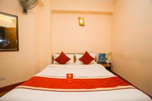 Rúm í herbergi á Hotel Premium