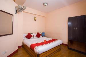 Rúm í herbergi á Hotel Premium