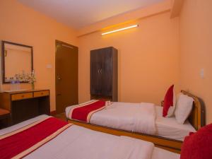 Rúm í herbergi á Hotel Premium