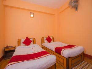 Rúm í herbergi á Hotel Premium