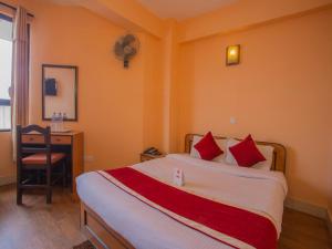 Rúm í herbergi á Hotel Premium
