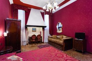 TV a/nebo společenská místnost v ubytování Hotel Al Ponte Mocenigo