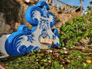 Kebun di luar Villa Ana Margarida Beach