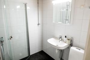 Ένα μπάνιο στο Apartamentos Joensuu - Kauppakatu 7