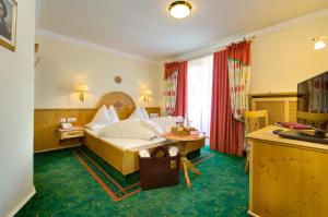 Μια τηλεόραση ή/και κέντρο ψυχαγωγίας στο Boutique-Hotel Bauer
