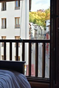 Ein Balkon oder eine Terrasse in der Unterkunft Urban Suites Granada