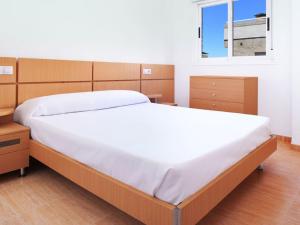Postel nebo postele na pokoji v ubytování APCOSTAS Torremar - Oropesa