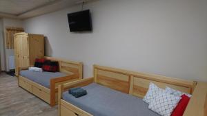 Ένα ή περισσότερα κρεβάτια σε δωμάτιο στο Apartmán Žamberk