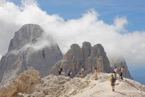 people are standing on top of a mountain at Hotel Col di Lana in Canazei