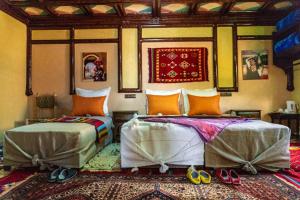 Voodi või voodid majutusasutuse Riad Atlas Panorama toas
