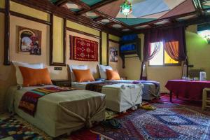 Voodi või voodid majutusasutuse Riad Atlas Panorama toas