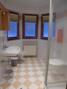 a bathroom with a sink and a shower at Residence Texel in Pfelders +23 photos