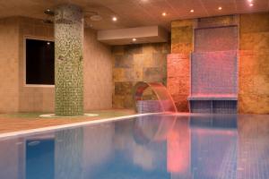 Bazén v ubytování htop Palm Beach & SPA #htopEnjoy nebo v jeho okolí