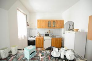 Kuchyň nebo kuchyňský kout v ubytování Apartment Citta Vecchia