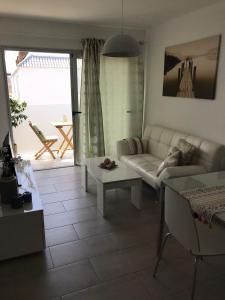 Posedenie v ubytovaní Apartamento Bristol Beach