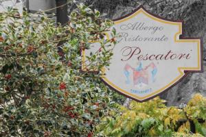 PiodeにあるAlbergo Dei Pescatoriのアレルギーの兆候 シャクナゲの植物