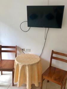 TV a/nebo společenská místnost v ubytování Hotel Santorini + 26 fotografií