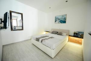 Postel nebo postele na pokoji v ubytování Apartment Citta Vecchia