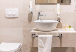 Koupelna v ubytování Hotel Grand Hedonist