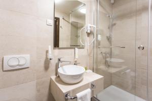Koupelna v ubytování Hotel Grand Hedonist
