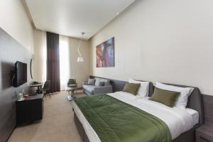Ένα ή περισσότερα κρεβάτια σε δωμάτιο στο Hotel Grand Hedonist