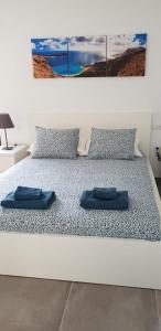 Posteľ alebo postele v izbe v ubytovaní Luxury Villa sea front Costa Teguise
