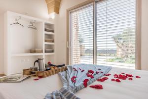 Ένα ή περισσότερα κρεβάτια σε δωμάτιο στο Villa Arja