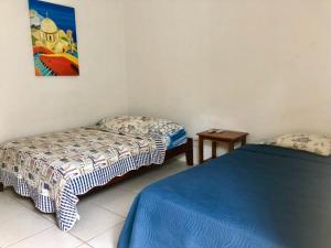 Letto o letti in una camera di Hotel Santorini