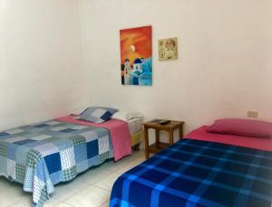 Letto o letti in una camera di Hotel Santorini