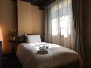 Postel nebo postele na pokoji v ubytování Shakespeare Hotel
