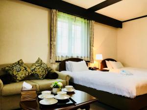 Postel nebo postele na pokoji v ubytování Shakespeare Hotel