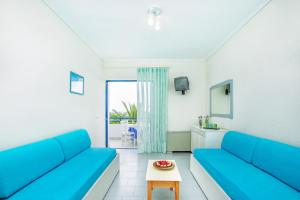 Posezení v ubytování Xenios Port Marina Hotel