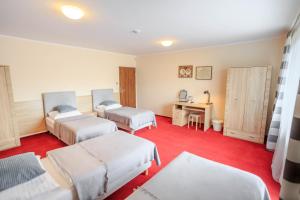 Posteľ alebo postele v izbe v ubytovaní Botanik Hostel